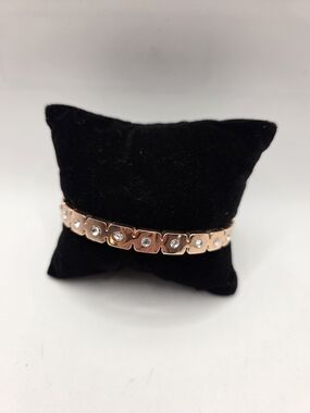 1657. Rose Gold Tone Crystal Clamp Bracelet